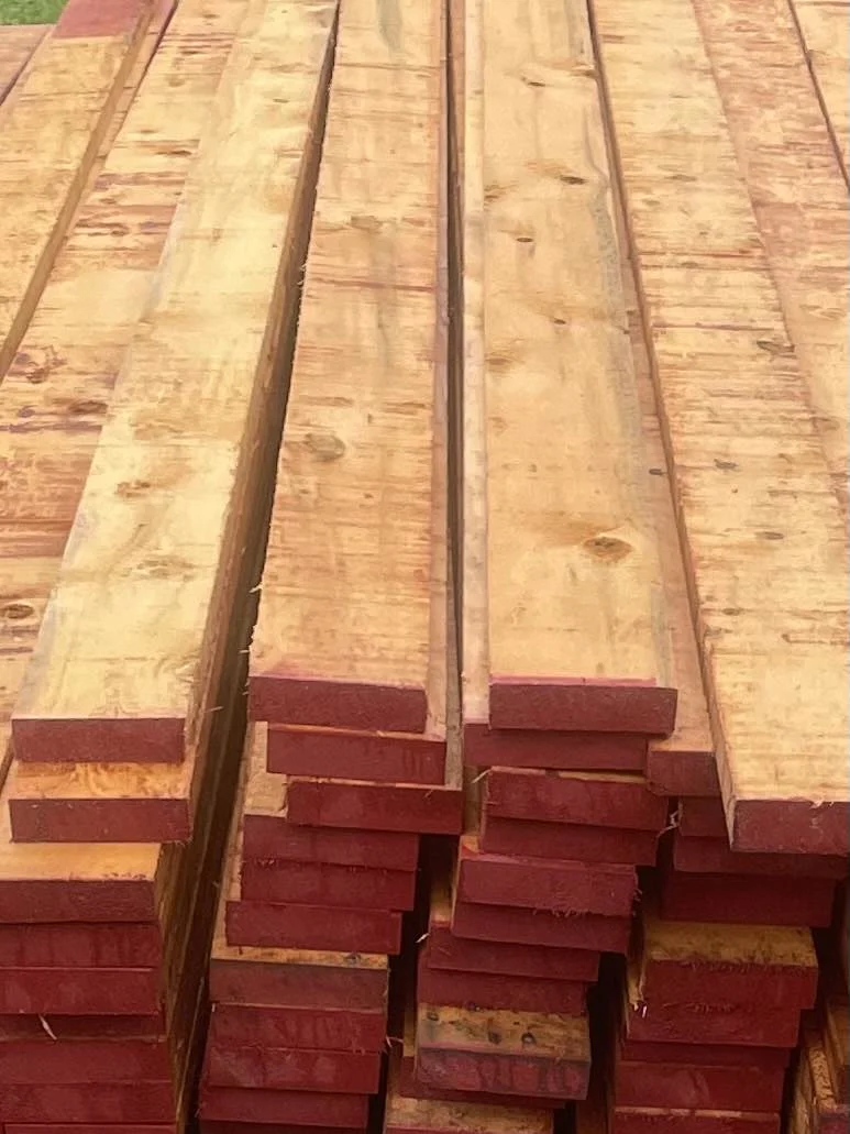 Stacked rough-sawn boards from the existing yellow cedar photo collection